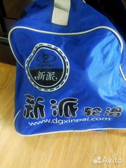 Роликовые коньки