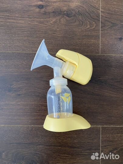 Молокоотсос medela электрический