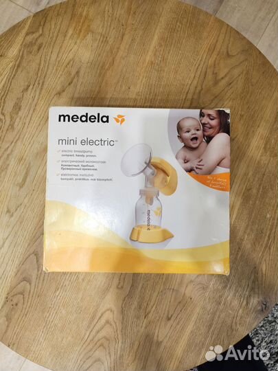 Молокоотсос medela электрический