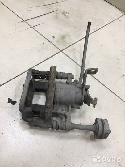 Суппорт задний правый Opel Astra