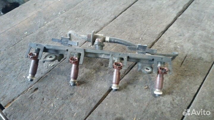 Блок форсунок Suzuki Liana