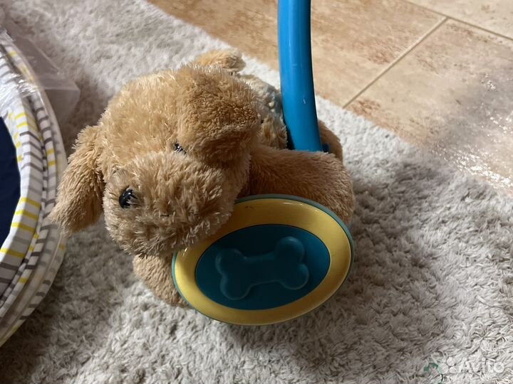 Игрушка каталка с ручкой