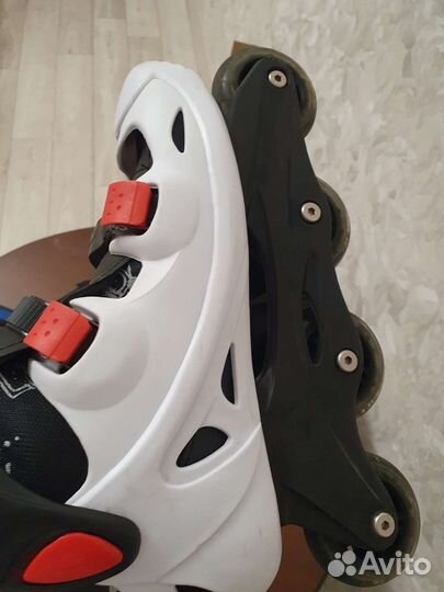 Роликовые коньки