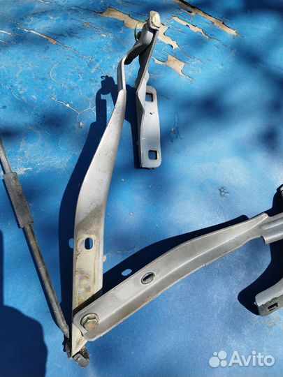 Петля капота Ниссан ноут е11