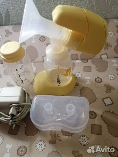 Молокоотсос medela