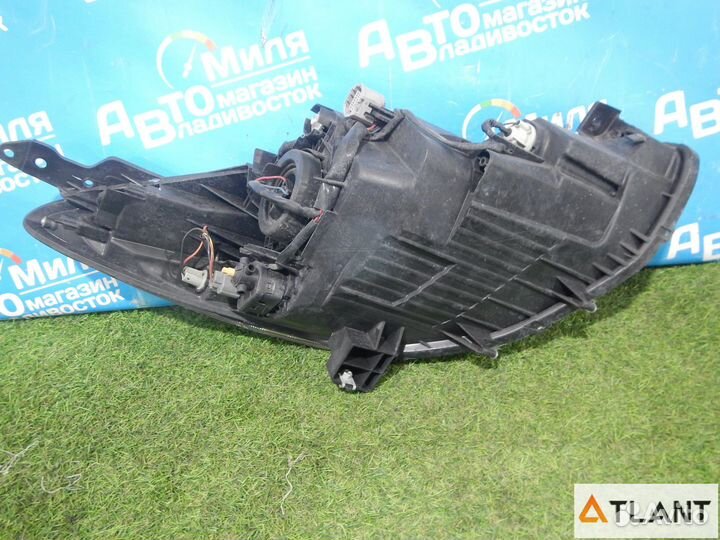 Фара левая mazda demio