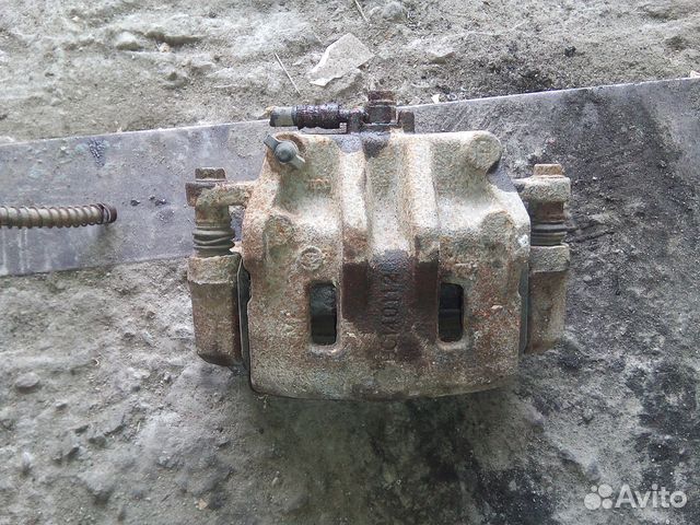 Суппорт передний левый Санг Енг Рекстон