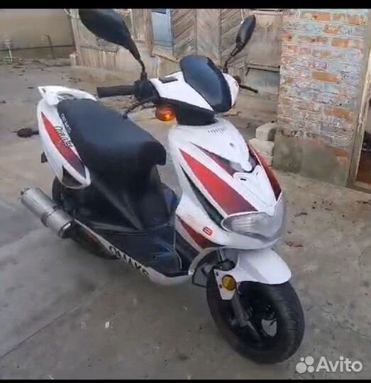 Скутер omaks