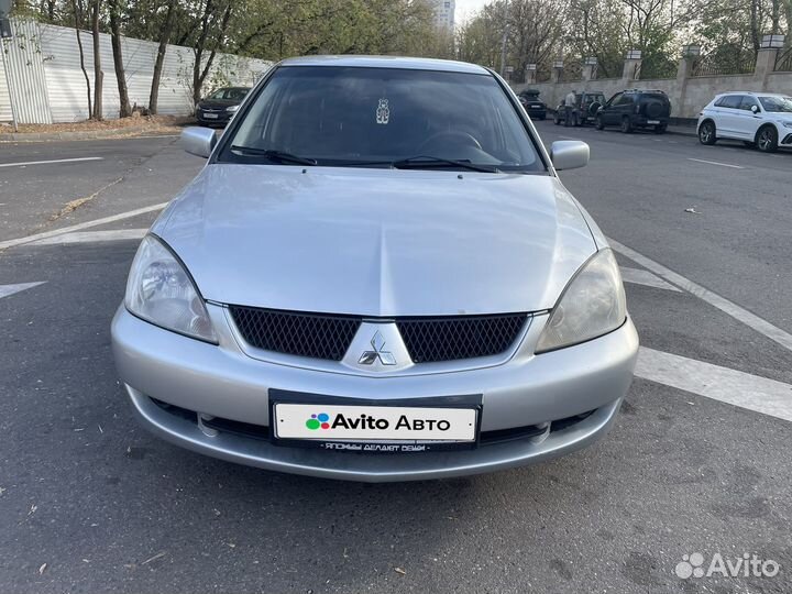 Mitsubishi Lancer 1.6 МТ, 2006, 205 000 км