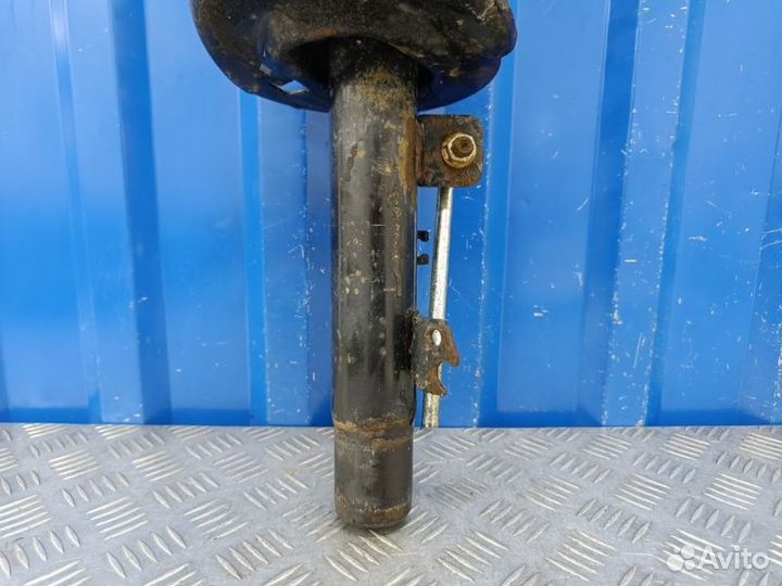 Амортизатор передний левый Peugeot 301 DD 1.6 NFP