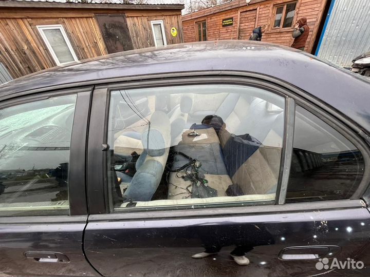 Стекло задней левой двери Honda Rafaga