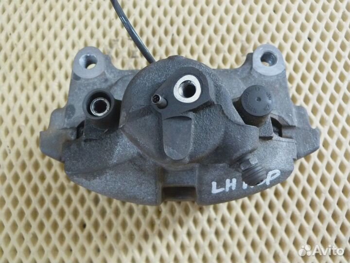 Суппорт передний левый VW Passat B7 2011-2015 (1K0615123E 1K0615125A)