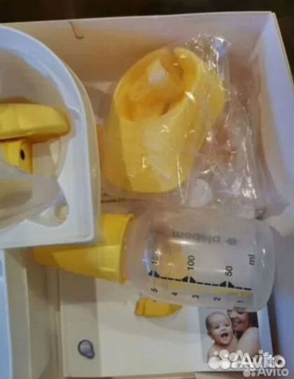 Молокоотсос medela электрический