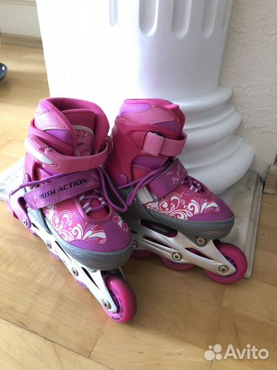 Роликовые коньки