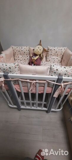 Детская кроватка с продольным маятником