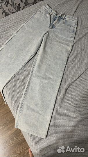 Джинсы клеш