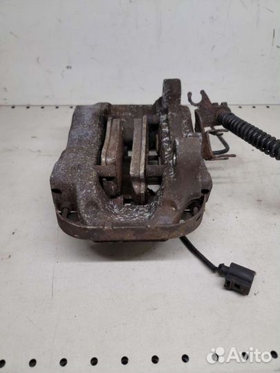 Суппорт задний левый правый VW Touareg 2003-2010