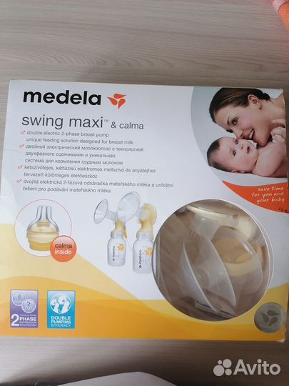 Молокоотсос medela электрический