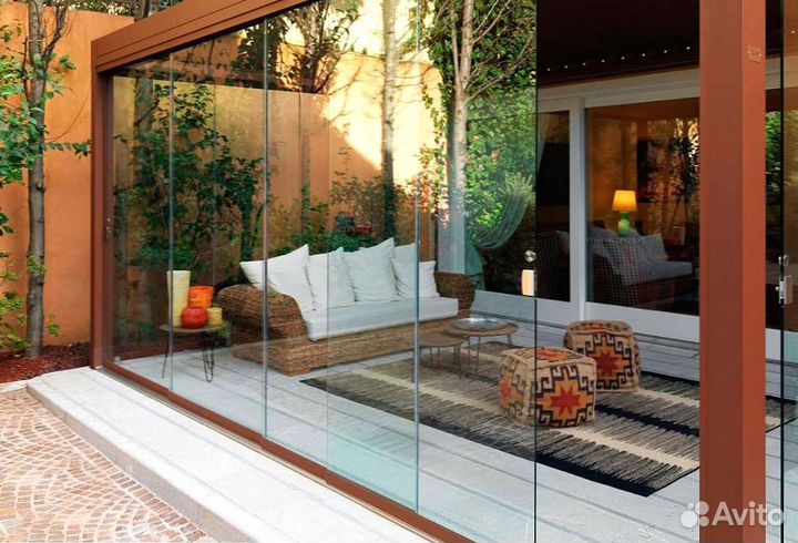 Безрамное раздвижное остекление