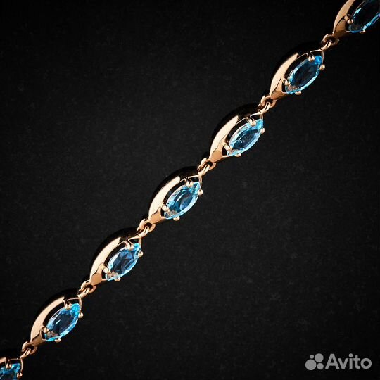 Браслет из красного золота с топазами