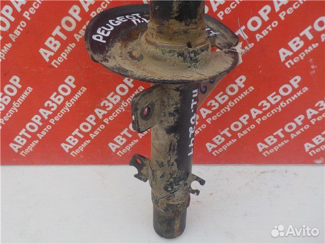 Амортизатор передний левый Peugeot 207 2006-2013