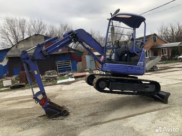 Рытье ям траншей мини экскаватором