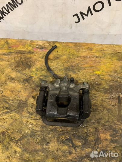 Суппорт задний левый Nissan Teana J32 Теана J32