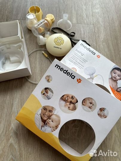 Молокоотсос medela электрический