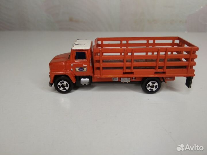 Грузовик американец высокий борт решетка