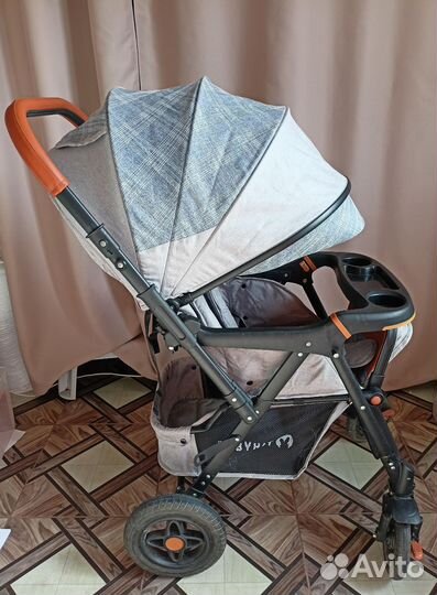 Детская коляска с перекидной ручкой