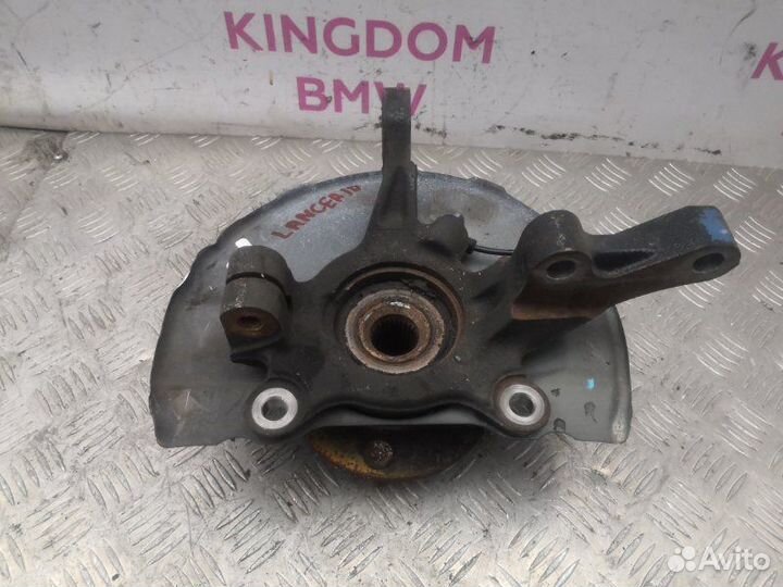 Поворотный кулак передний левый Mitsubishi Lancer