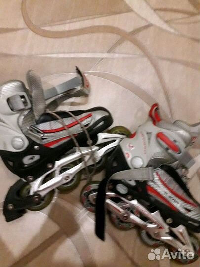 Коньки роликовые