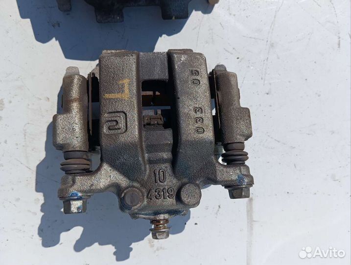 Суппорт тормозной задний Nissan Fuga Infiniti M Q