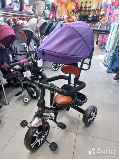 Трехколесный велосипед с ручкой