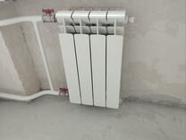 Радиатор отопления 4 секции Rifar 500 бимета�лл