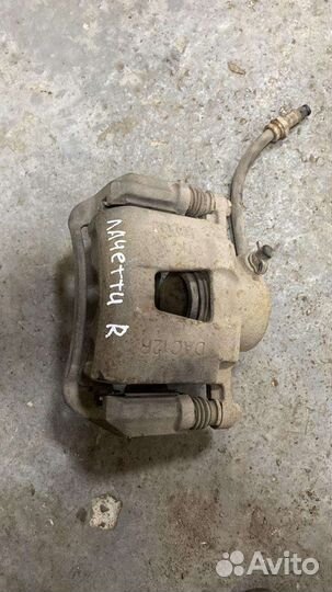 Суппорт тормозной передний правый Chevrolet Lachet