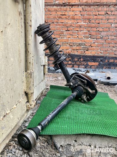 Амортизатор передний левый VW Caddy 2K