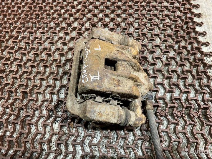 Суппорт задний левый Спортаж 2 Kia Sportage