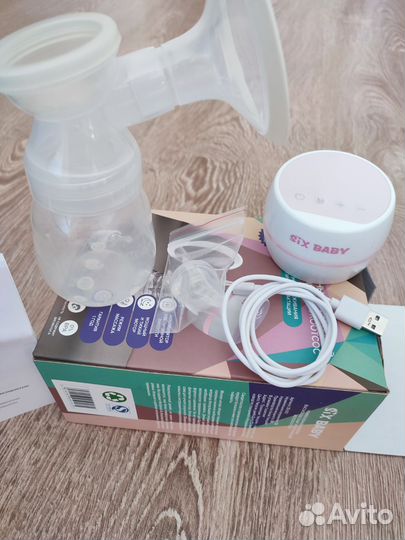 Молокоотсос электрический