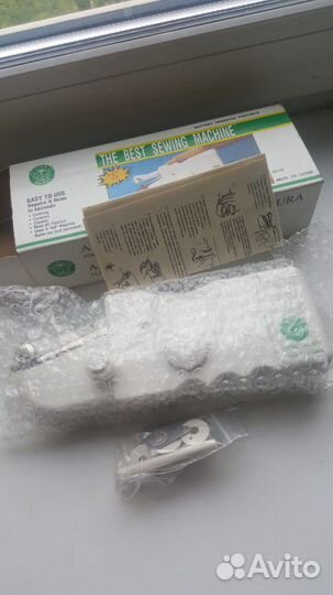 Портативная швейная машинка