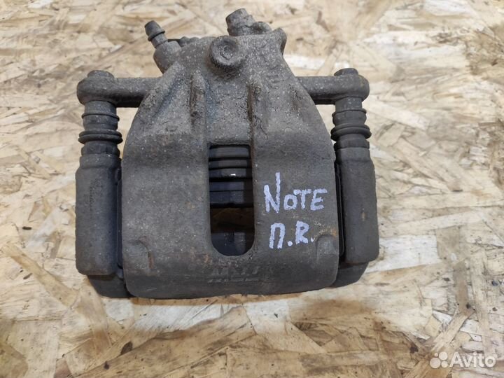 Суппорт передний правый Nissan Note