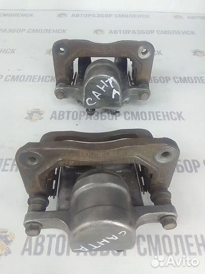 Суппорт задний левый / правый Hyundai Santa Fe