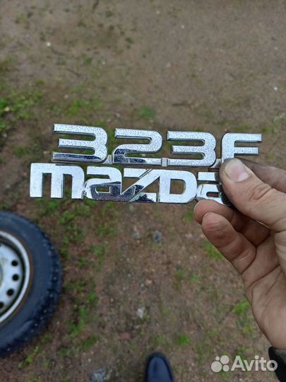 Шильдики mazda 323