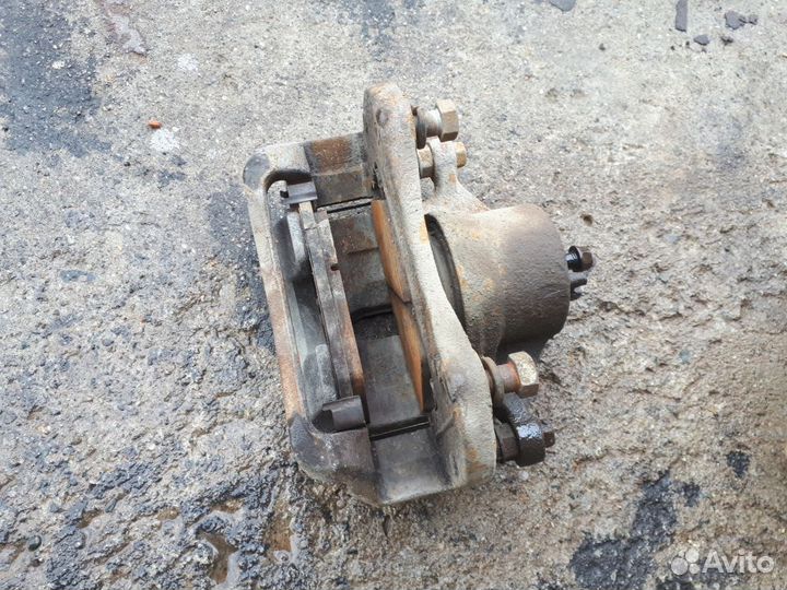 Суппорт передний левый Kia Sportage 3