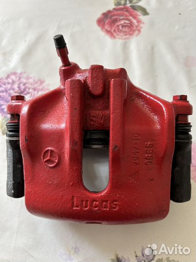 Суппорт передний девый mercedes 124