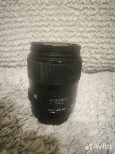 Объектив Sigma AF 35mm f/1.4 DG HSM ART Canon EF