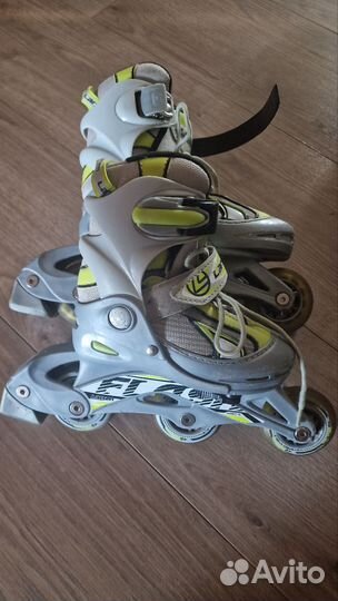 Роликовые коньки