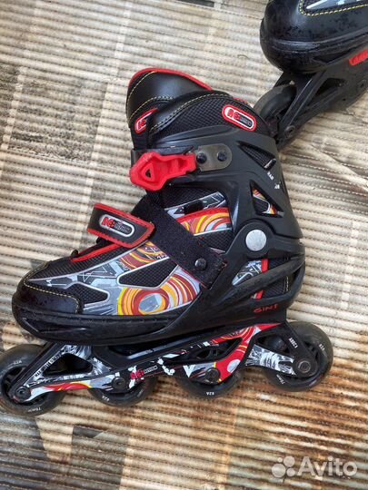 Роликовые коньки