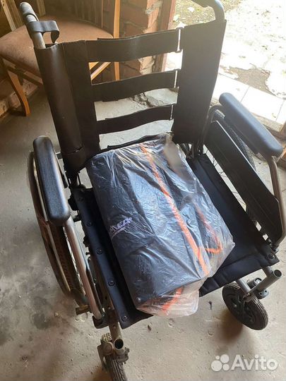 Инвалидная коляска