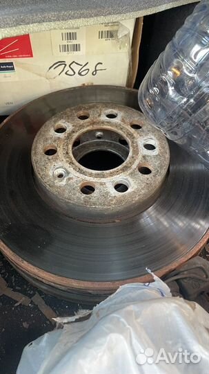 Супорт в сборе с дисками